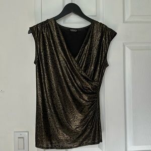 Sleeveless Gold and Bronze blouse.